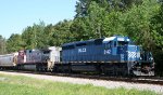HLCX 8142 & BNSF 679 are tied down in the siding on a CSX train
